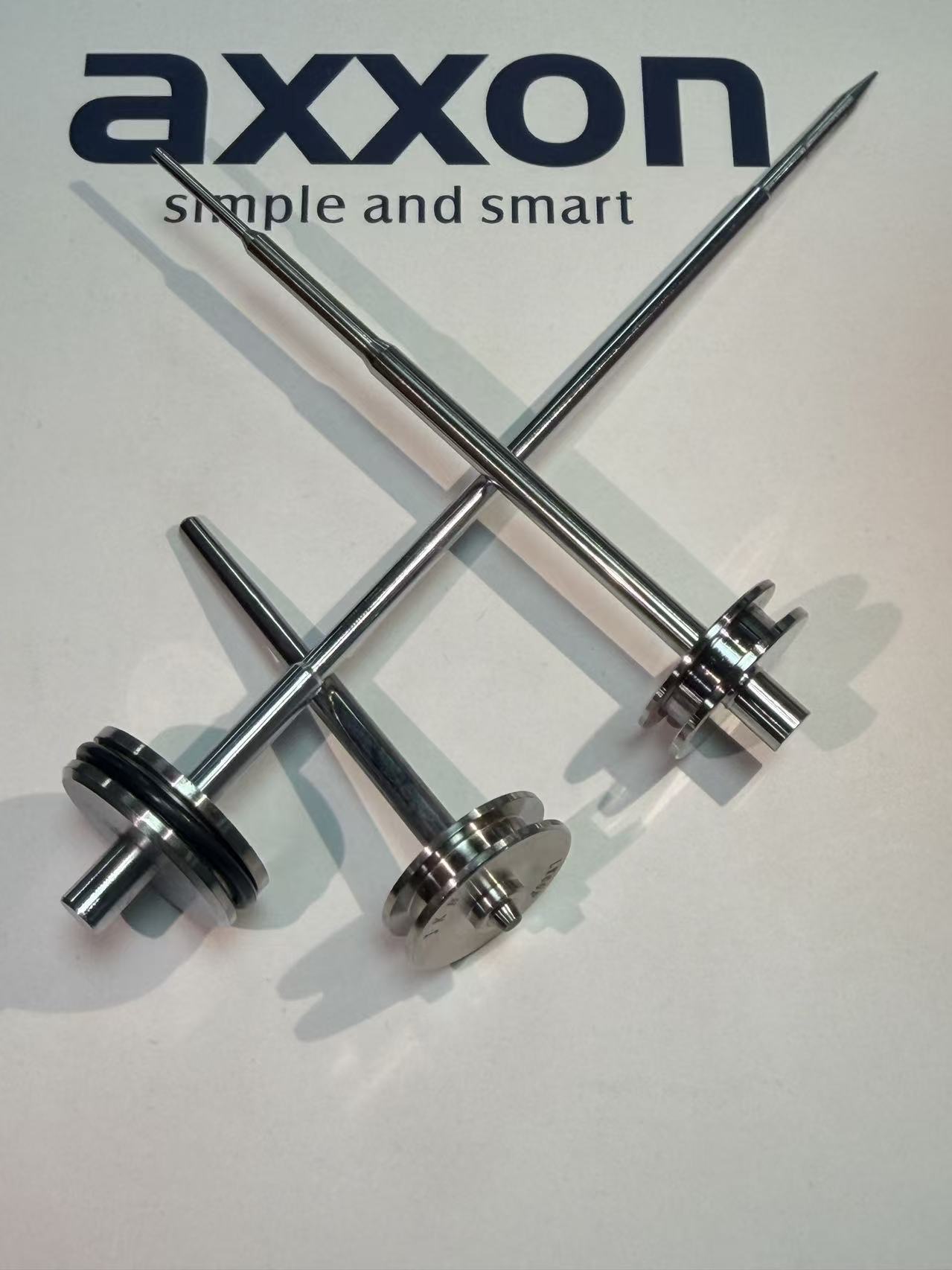 Tappet/Snáthaid Axxon